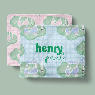 Personalized golf baby blankets with golf clubs, balls, and course designs in pink, blue, and green.