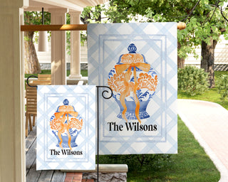 Elegant autumn garden flag with watercolor pumpkin, orange ribbon, and custom family name