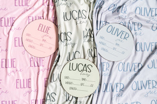 Custom purple baby swaddle for girls, made from stretchy, breathable fabric for a cozy newborn wrap.