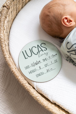 Stretchy personalized newborn swaddle with matching beanie hat