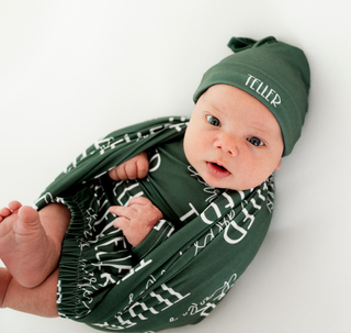 Newborn name swaddle in sage green for baby shower gift