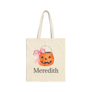 Personalized Halloween tote bags with cute spooky designs including bats, witches, pumpkins, ghosts, and more – custom name printed on each canvas bag for trick-or-treating.