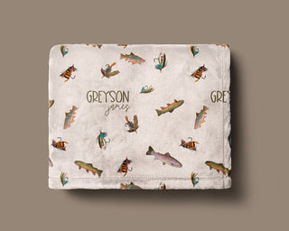 Custom minky blanket featuring trout, fishing flies, and personalized name for baby or toddler