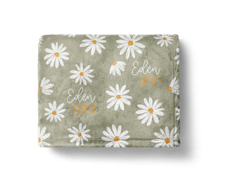 Personalized daisy baby blanket with custom name and soft floral print
