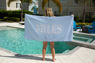 Personalized kids beach towel with pastel stripes and custom name, soft preppy summer towel for pool and beach days