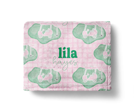 Personalized pink and green golf baby blanket with golf clubs and custom name