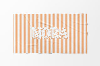 Personalized toddler beach towel with pastel stripes, soft absorbent towel for summer, pool, and beach trips