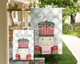 Classic Christmas nutcracker garden flag featuring traditional colors and gingham pattern – custom family yard décor