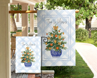 Personalized coastal Christmas garden flag with citrus tree and family name – custom outdoor holiday décor