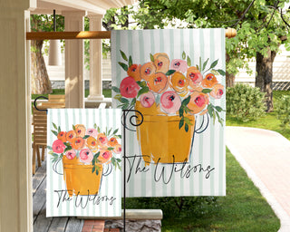 Custom floral garden flag with watercolor sunflowers, blush blooms, mason jar, and personalized family name for farmhouse yard decor.