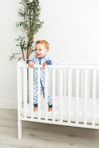 Gender-neutral bamboo baby PJs with rope knot coastal print