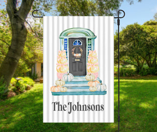 Autumn harvest front porch flag with pumpkin stacks, seasonal wreath, and family name personalization