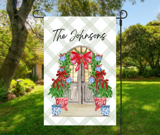 Personalized Christmas garden flag with red bows, greenery, and chinoiserie planters – The Navy Knot holiday décor