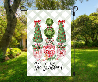 Personalized Christmas garden flag with festive topiary trees and red chinoiserie planters – The Navy Knot holiday décor