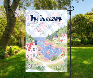 Personalized patriotic garden flag coastal cottage cliffside scene with fireworks custom family name preppy Americana outdoor decor The Navy Knot