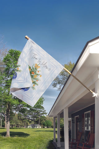 Elegant blue chinoiserie holiday garden flag with citrus tree and gold ribbon – The Navy Knot Christmas collection