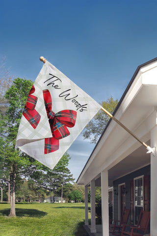 Red tartan bow personalized garden flag for families – custom outdoor Christmas decor by The Navy Knot
