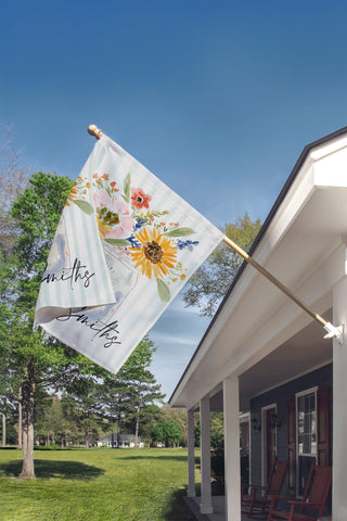 Custom autumn garden flag with watercolor sunflowers, pink florals, and a mason jar personalized with your family name for farmhouse porch decor.